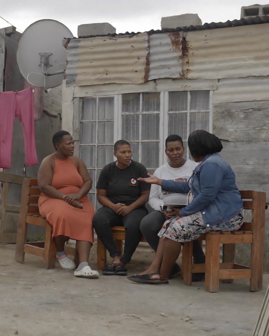 A small faith community sharing a meal together